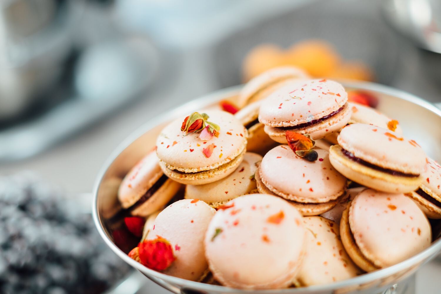 French macarons in a bowl; how to start a bakery business | Bplans Blog
